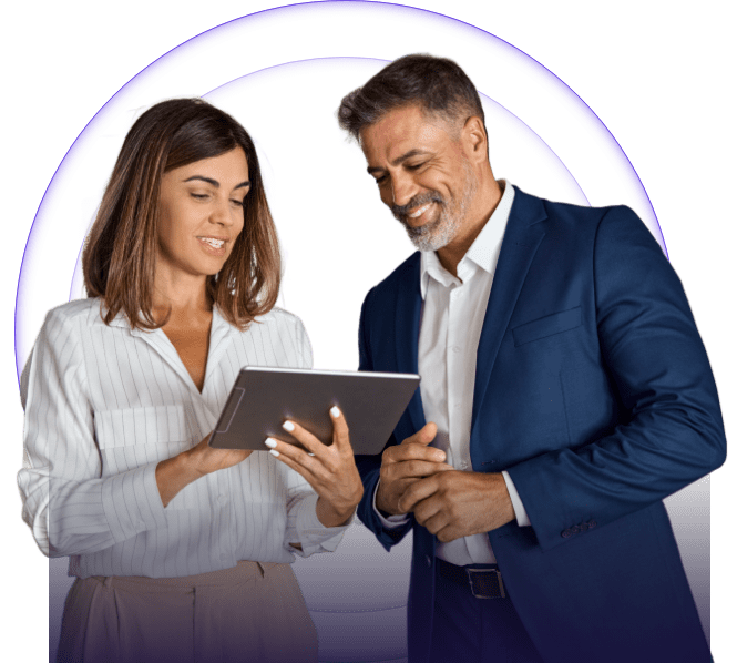 man and woman working on a tablet